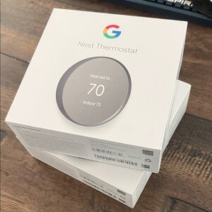 Google Nest Thermostat in charcoal new in box, two available